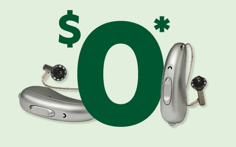A pair of hearing aids with a prominent green '$0*' symbol displayed on a light green background.