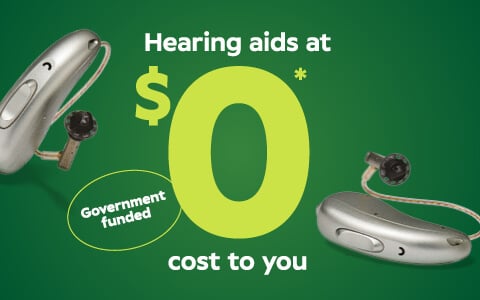 Two hearing aids are shown on a green background with a large '$0*'' and a 'Government funded' label in the center.