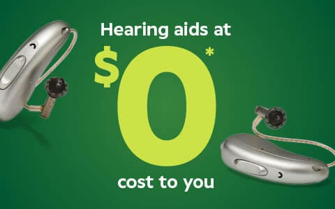 Two hearing aids displayed with text: $0* hearing aids with the Ministry of Health, on a green background.