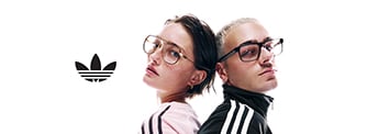 2 androgynous people wearing large adidas Originals glasses and adidas tracksuits pose back-to-back in front of the adidas logo on a white background.